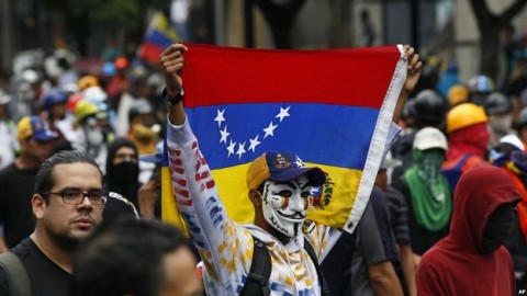 Venezuela's Maduro hikes wages amid protests