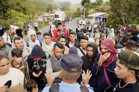 Honduran migrant group treks north as U.S. calls for tighter borders