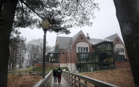In this April 6, 2018 photo, students walk on the campus of Mount Ida College in Newton, Mass. Photo: Craig F. Walker/The Boston Globe via AP