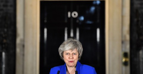 Theresa May speaks to reporters after surviving a no-confidence vote on January 16. Photo: Ben Stansall / AFP / Getty
