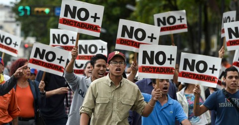 Opposition demonstrators protest against Venezuelan President Nicolas Maduro in Caracas on Jan. 30, 2019. Photo: Juan Barreto / AFP – Getty Images