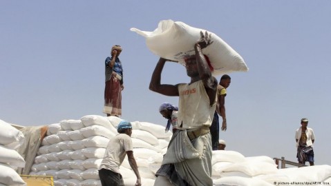 Aid supplies ae unloaded at a port in Yemen. Photo: H. Issa / AP