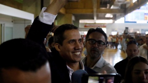 Juan Guaidó was greeted by thousands of supporters on his return on Monday