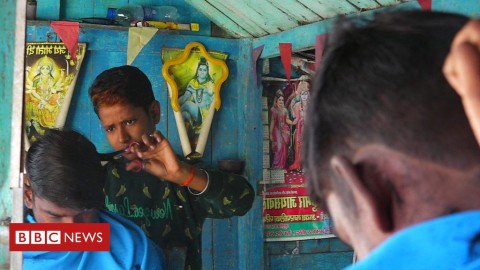 The woman who dresses 'like a boy' to work as a barber