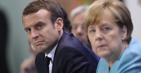  German Chancellor Angela Merkel (R) and French President Emmanuel Macron (L) after a meeting of EU leaders in Berlin, in 2017