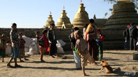 Ethnic Mro refugees displaced by fighting between Arakan Army rebels and Myanmar soldiers gather at a pagoda compound during a January 2019 government-organised visit to Buthidaung, in the restive Rakhine state. 