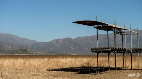 View of a pier at the dried Aculeo Lake, about 70 km southwest of Santiago, Chile. 