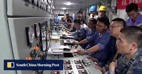 Technicians are seen at the control panels of China’s new aircraft carrier in footage from its recent sea trial. 
