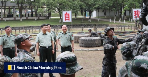Chinese President Xi Jinping watches a training session at the PLA’s Army Infantry Academy.