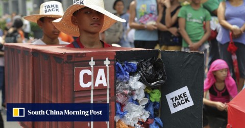 A 2015 file photo showing environmental activists in the Philippines protesting to demand Canada take back containers of waste that had been sent to the Southeast Asian nation. 