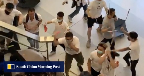 Men in white brandishing sticks and metal rods had attacked commuters at Yuen Long MTR station on Sunday.