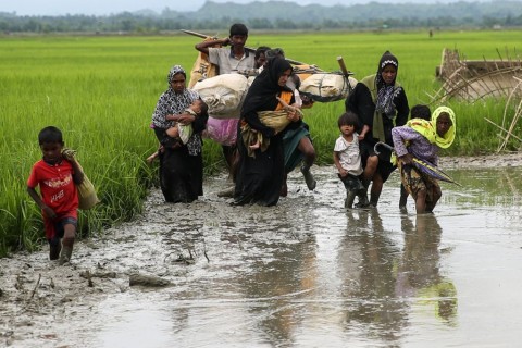 Burma security forces are burning down villages to drive out Rohingya Muslims and shooting those that flee