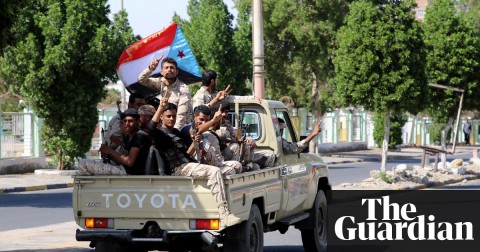 Southern Yemeni separatist fighters flash the ‘V’ sign as they ride through Aden’s streets on Monday. Photograph: Fawaz Salman/Reuters