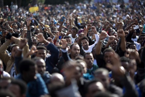 African migrants protest about the deportation plans in Rabin Square, Tel Aviv. AP