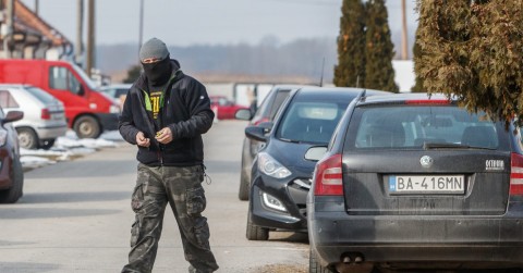 An officer of the investigation team walks along at the crime site where Slovak journalist Ján Kuciak and his girlfriend was found shot dead | Michal Smrcok/EFE