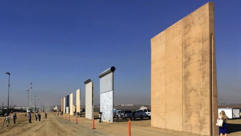 This 2017 file photo shows prototypes of border walls in San Diego, Calif. President Trump will visit the city on Tuesday to inspect them. Photo: Elliott Spagat / AP