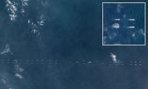 Satellite images have emerged showing dozens of Chinese naval vessels putting on a show of force in the South China Sea. Photo: Reuters