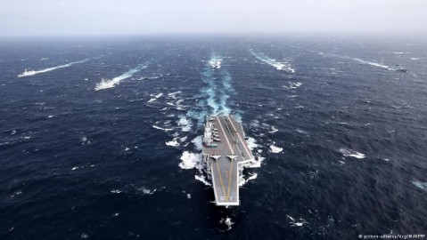 PLA Navy’s aircraft carrier Liaoning with its battle group. Photo: gjp / MaxPPP