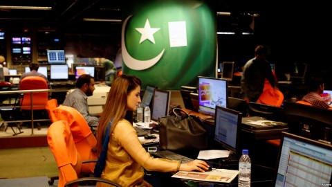 An employee works at the control room of the Geo News television channel in Karachi, Pakistan, April 11, 2018. Photo: Reuters