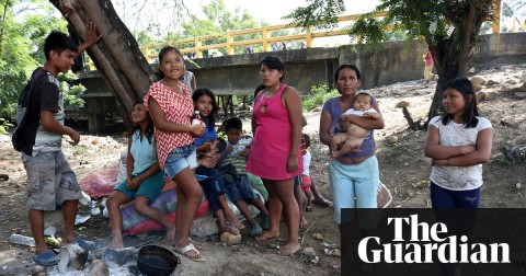 Not welcome in Colombia, indigenous migrants stuck at border after fleeing Venezuela