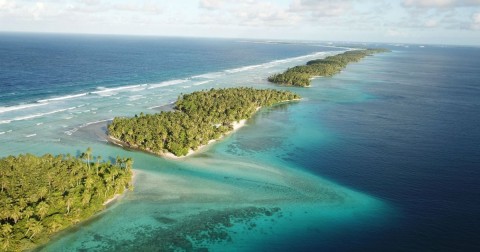 A thin strip of coral atolls separates the ocean from the lagoon in Majuro, Marshall Islands. Photo: Nicole Evatt / AP