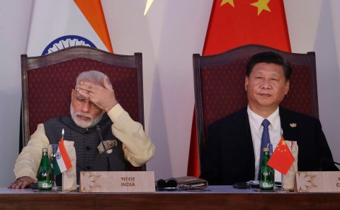 In this Oct. 16, 2016, file photo, Indian Prime Minister Narendra Modi, left, and Chinese President Xi Jinping attend the BRICS summit in Goa, India. Photo:Manish Swarup, AP