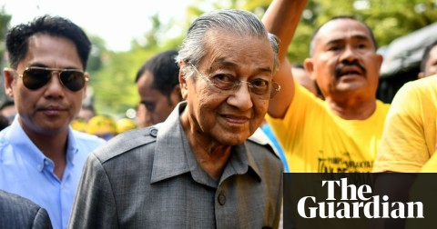 Former Malaysian prime minister Mahathir Mohamad arrives during a rally. Photograph: Mohd Rasfan/AFP/Getty Images