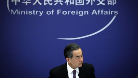 Chinese State Councilor and Foreign Minister Wang Yi reacts during a news conference at the Ministry of Foreign Affairs in Beijing, April 3, 2018. Photo: AP
