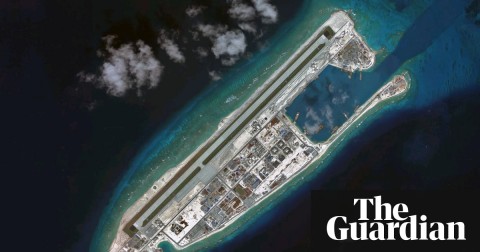 An aerial photograph of Fiery Cross Reef, where it is reported that missiles have been installed Photograph: DigitalGlobe/Google