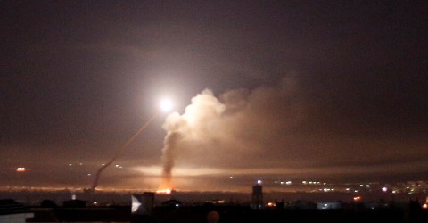 Missile fire is seen from Damascus. Photo: Omar Sanadiki / Reuters
