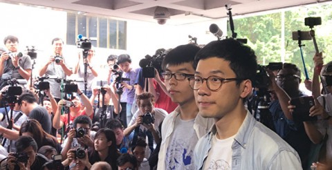 香港學生領袖黄之鋒等3人被加刑 國際關注