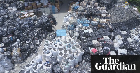 E-waste is piled high at a dump site in Samut Prakan province, south of Bangkok. Photograph: Florian Witulski for the Guardian