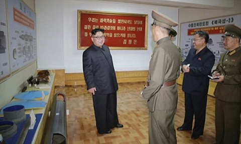 North Korea's Kim orders production of more rocket engines, warheads