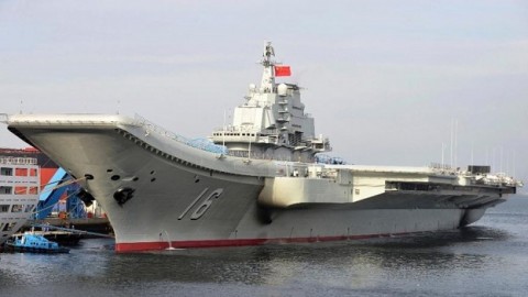 China's 1st aircraft carrier sails into South China Sea