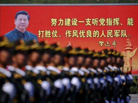 China's Xi says won't let anyone make 'fuss' about its territory